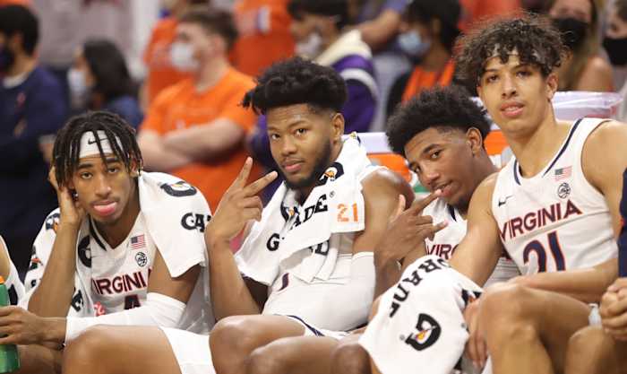 Armaan Franklin, Jayden Gardner, Reece Beekman, and Kadin Shedrick pose for the camera during a Virginia men's basketball game.